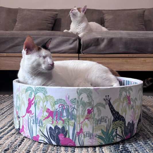 Durable multi-purpose cat scratcher bed with aesthetic design in natural cardboard.