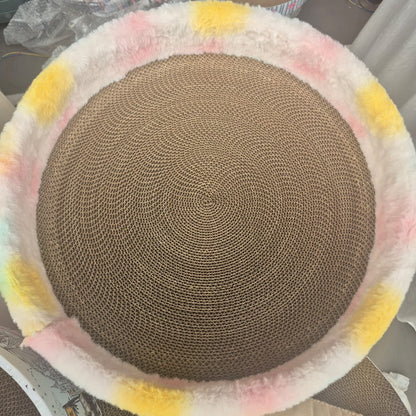 Round woven mat with colorful border on a surface